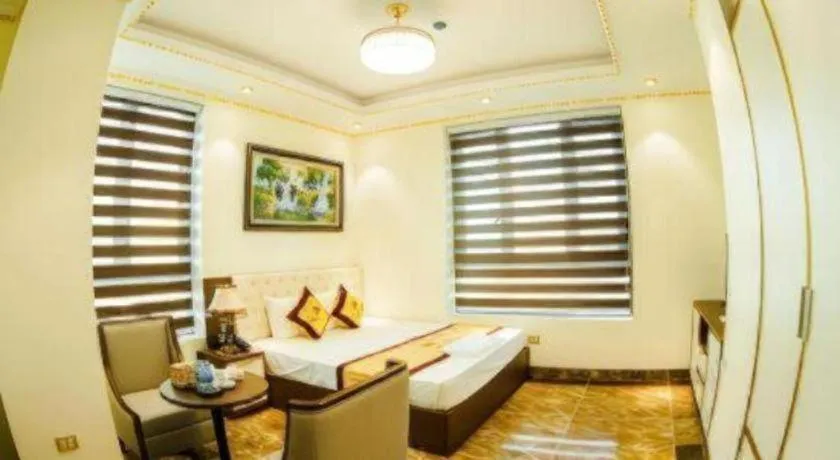 Bed in BACNINH HARMONY HOTEL