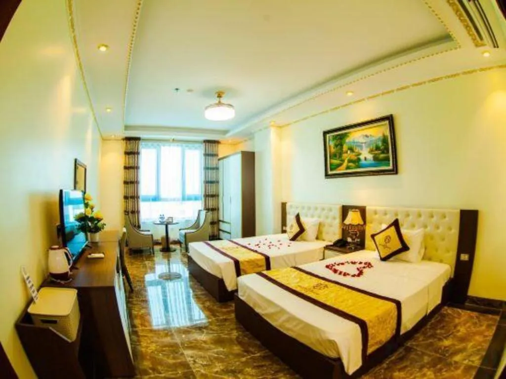 Bed in BACNINH HARMONY HOTEL