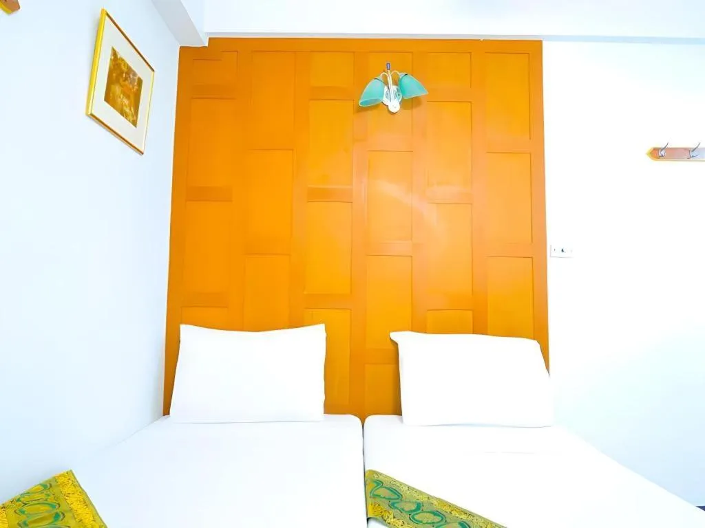 Bed in New Siam Guest House