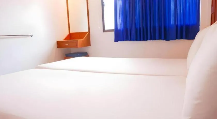 Bed in New Siam Guest House