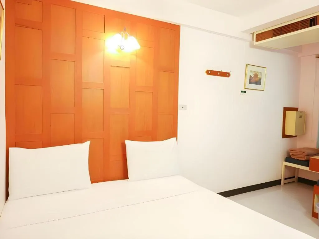 Bed in New Siam Guest House