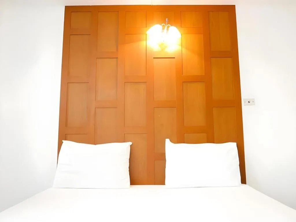 Bed in New Siam Guest House