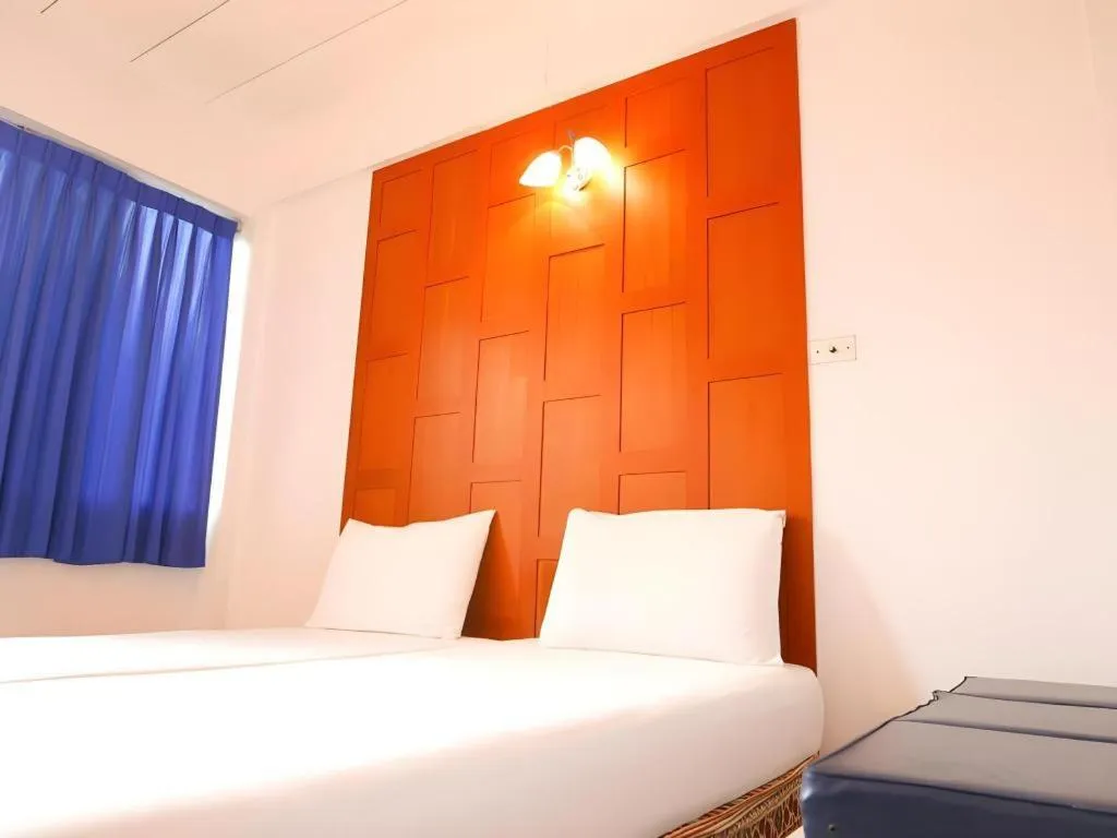 Bed in New Siam Guest House