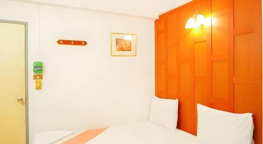 Bed in New Siam Guest House