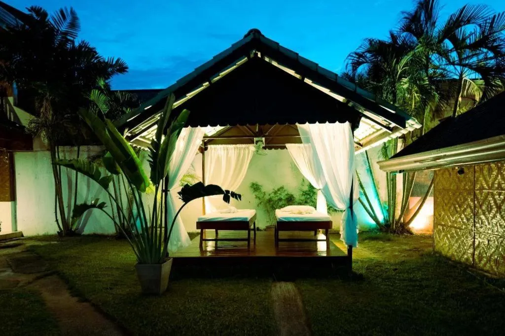 Bed in Coucou Bar Hotel and Restaurant