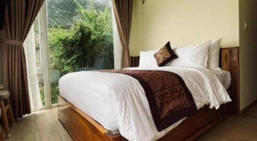 Bed in La Roza Dalat Boutique Hotel