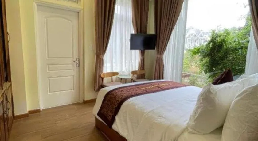 Bed in La Roza Dalat Boutique Hotel