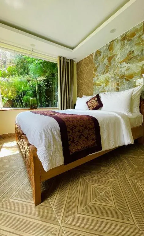Bed in La Roza Dalat Boutique Hotel