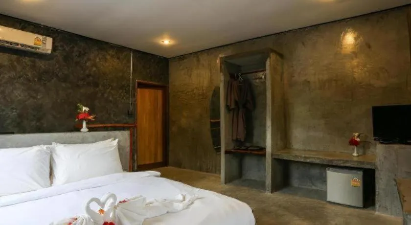 Bed in Koh Mook De Tara Beach Resort