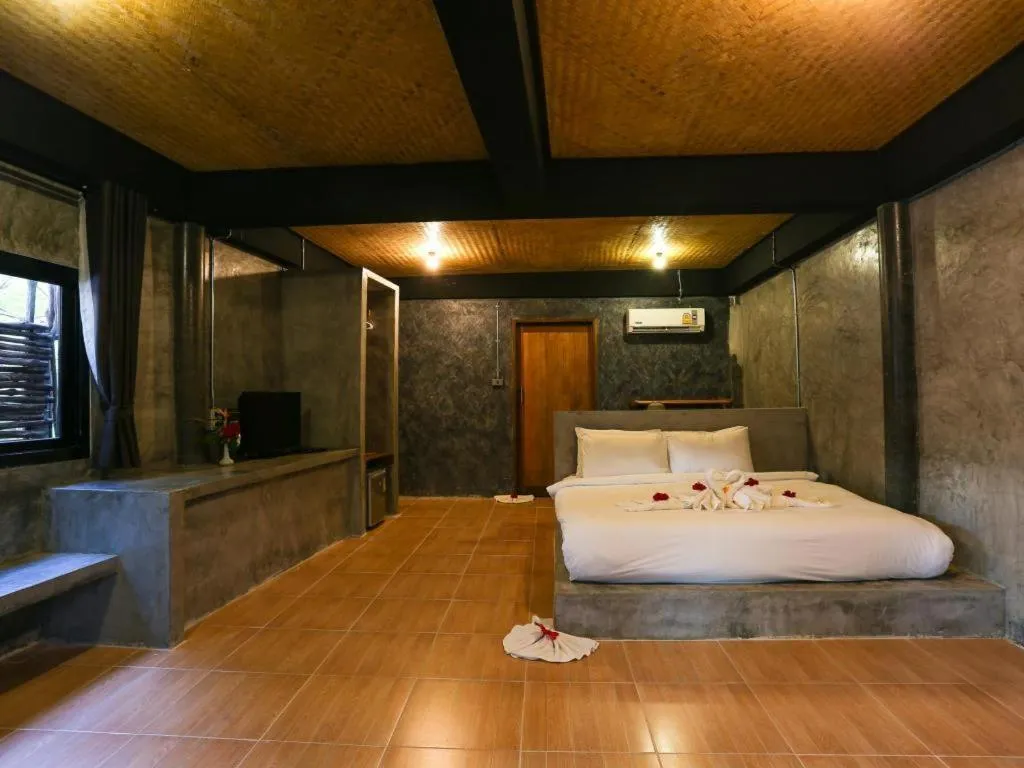 Bed in Koh Mook De Tara Beach Resort