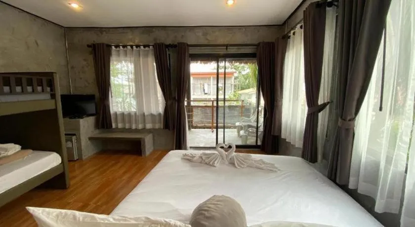 Bed in Koh Mook De Tara Beach Resort