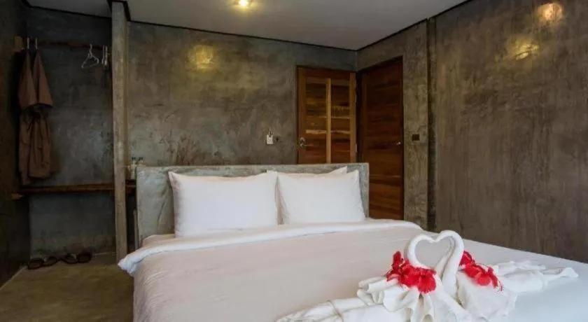 Bed in Koh Mook De Tara Beach Resort