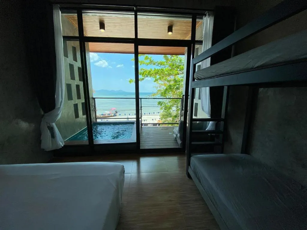 Bed in Koh Mook De Tara Beach Resort