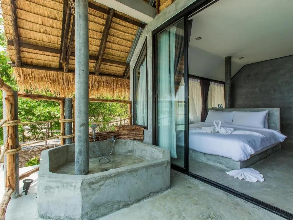 Bed in Koh Mook De Tara Beach Resort