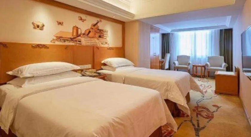 Bed in Vienna Hotel Xi'an Zhonglou