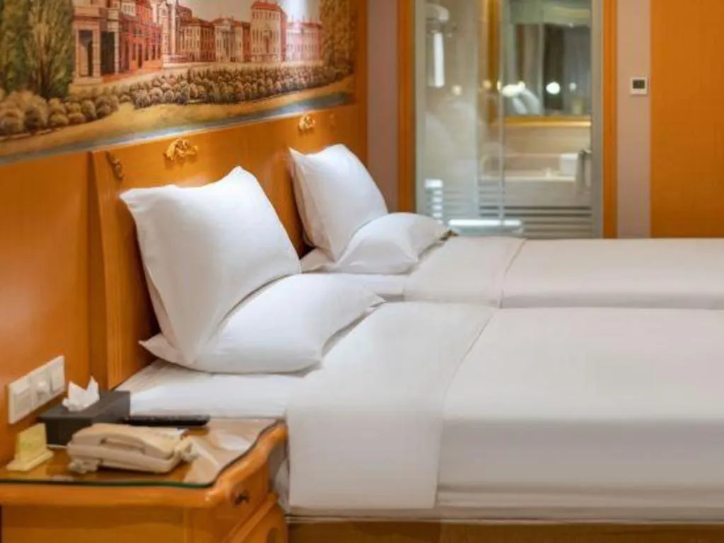 Bed in Vienna Hotel Xi'an Zhonglou