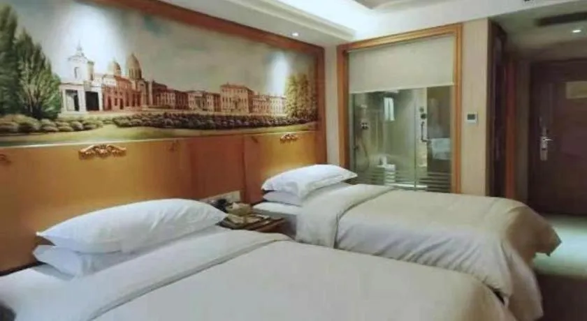 Bed in Vienna Hotel Xi'an Zhonglou