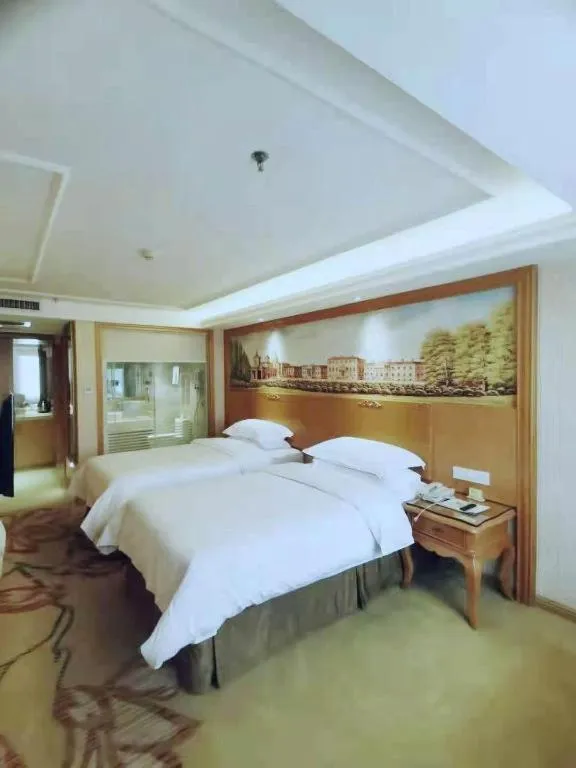 Bed in Vienna Hotel Xi'an Zhonglou