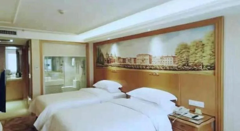 Bed in Vienna Hotel Xi'an Zhonglou