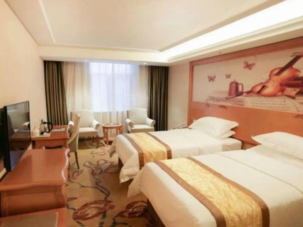 Bed in Vienna Hotel Xi'an Zhonglou