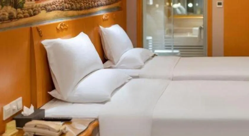 Bed in Vienna Hotel Xi'an Zhonglou