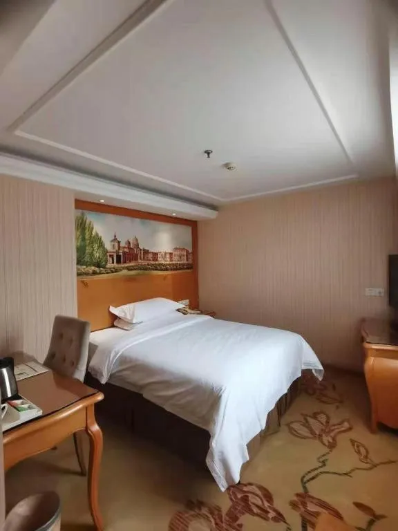 Bed in Vienna Hotel Xi'an Zhonglou