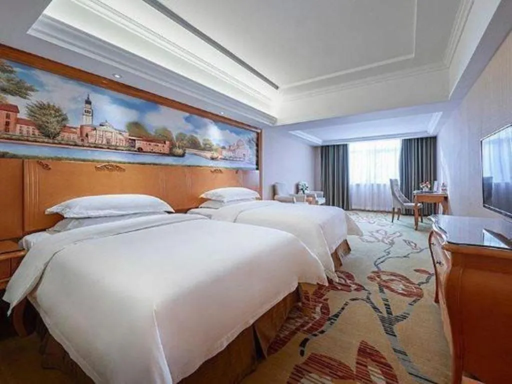 Bed in Vienna Hotel Xi'an Zhonglou