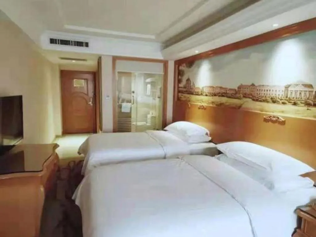 Bed in Vienna Hotel Xi'an Zhonglou