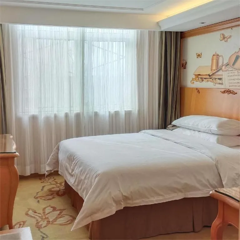 Bed in Vienna Hotel Xi'an Zhonglou