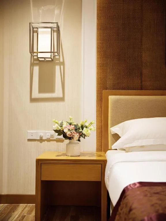 Bed in Cheermore Recreation Hotel Guangzhou Zhimao Yuan Ecological Spa Leisure Hotel