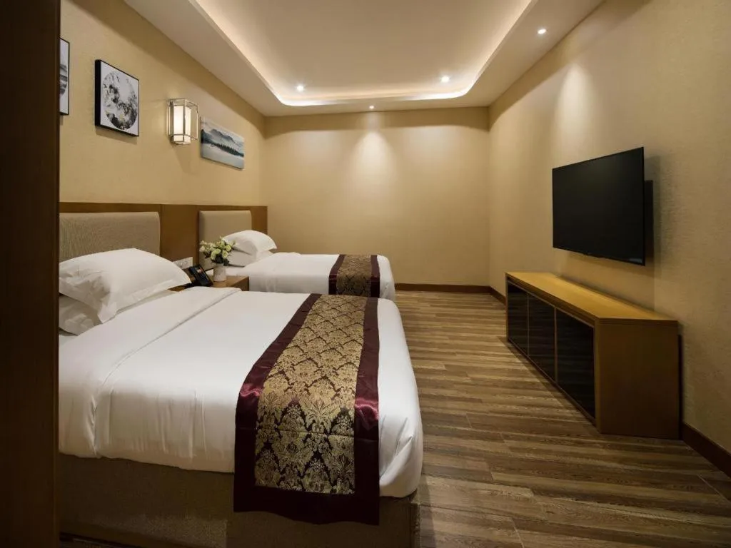 Bed in Cheermore Recreation Hotel Guangzhou Zhimao Yuan Ecological Spa Leisure Hotel