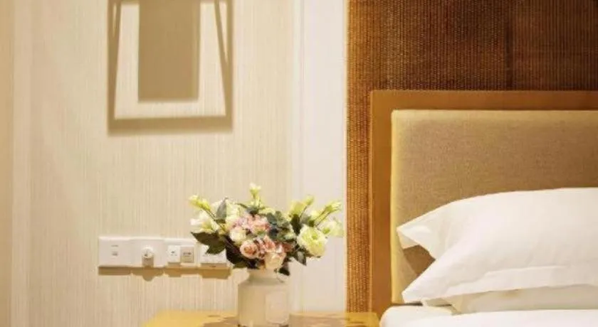 Bed in Cheermore Recreation Hotel Guangzhou Zhimao Yuan Ecological Spa Leisure Hotel