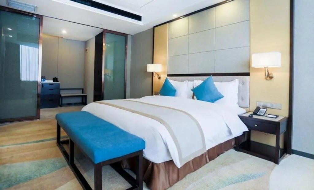 Bed in Hundred Hotel Qingdao