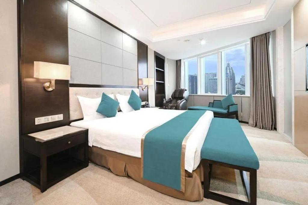 Bed in Hundred Hotel Qingdao