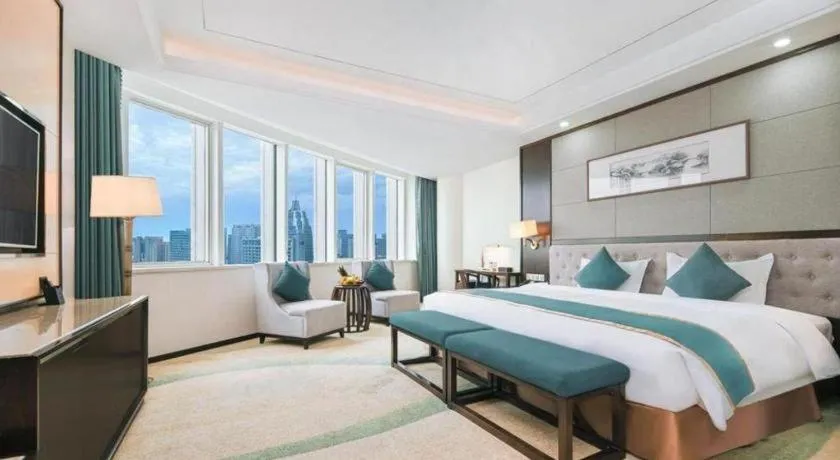 Bed in Hundred Hotel Qingdao