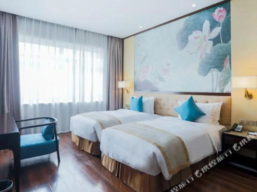 Bed in Hundred Hotel Qingdao