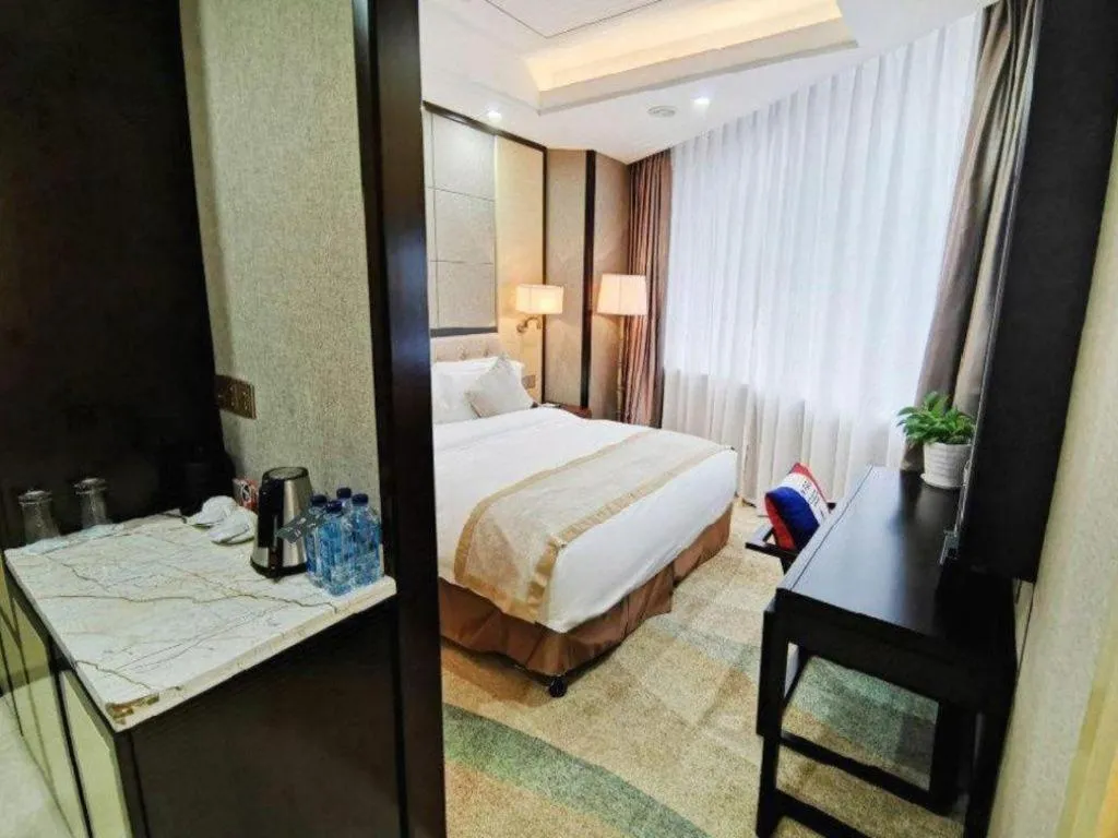 Bed in Hundred Hotel Qingdao