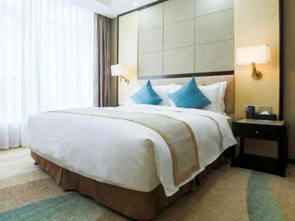 Bed in Hundred Hotel Qingdao