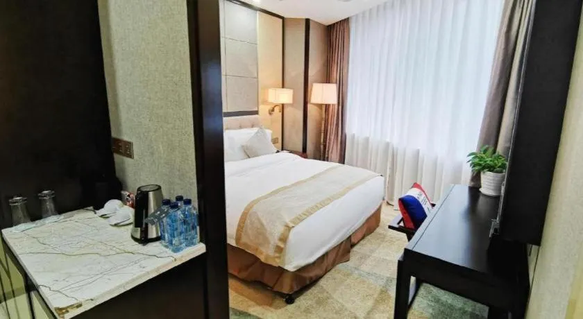 Bed in Hundred Hotel Qingdao