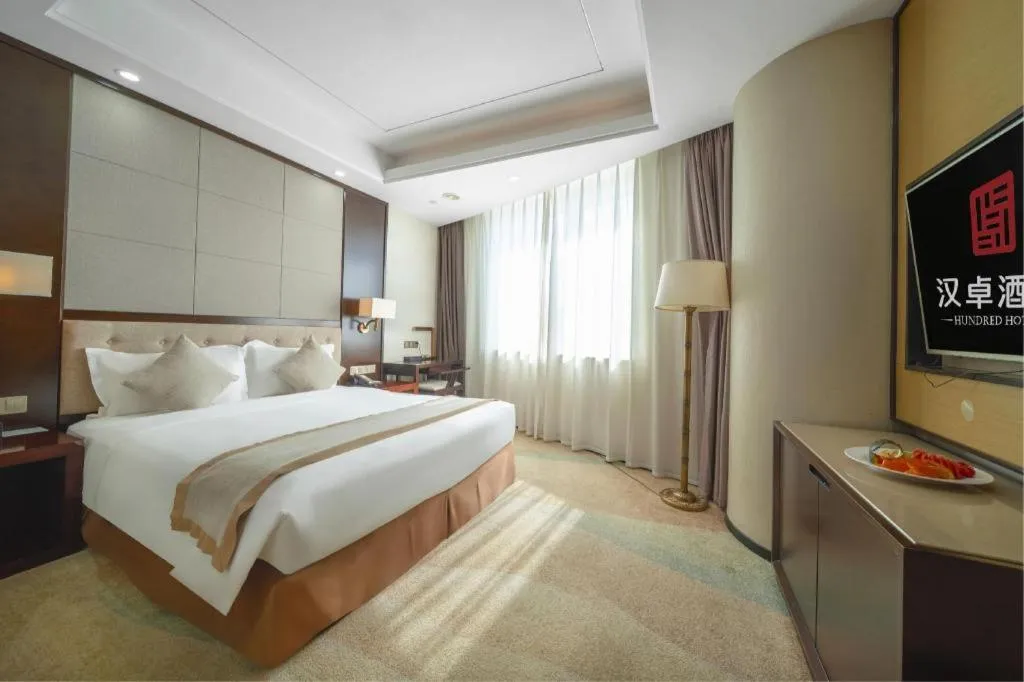 Bed in Hundred Hotel Qingdao