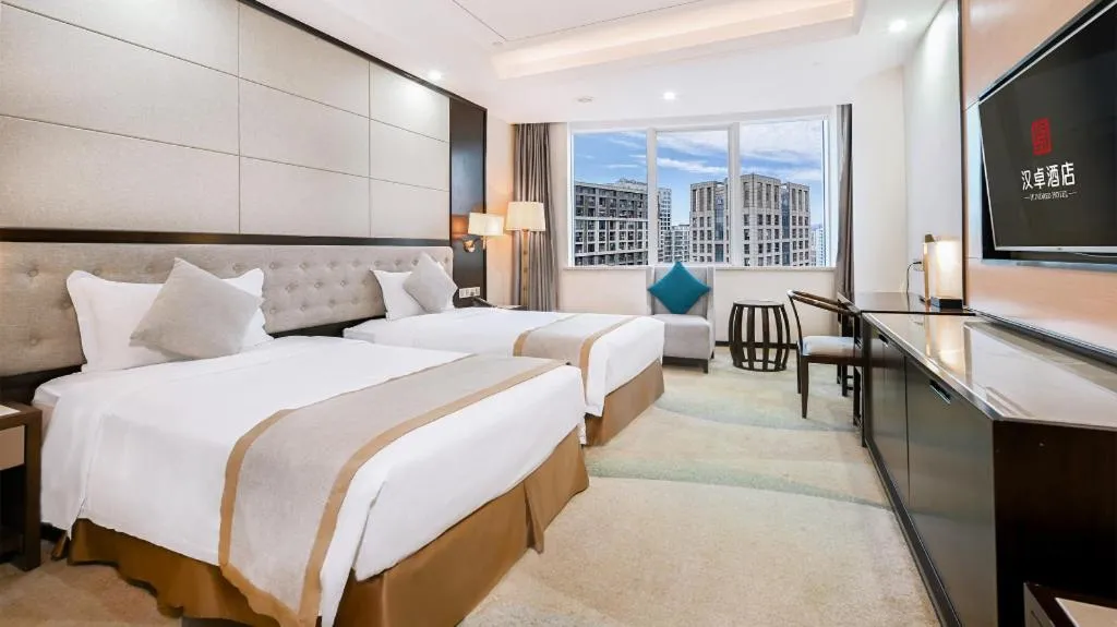 Bed in Hundred Hotel Qingdao