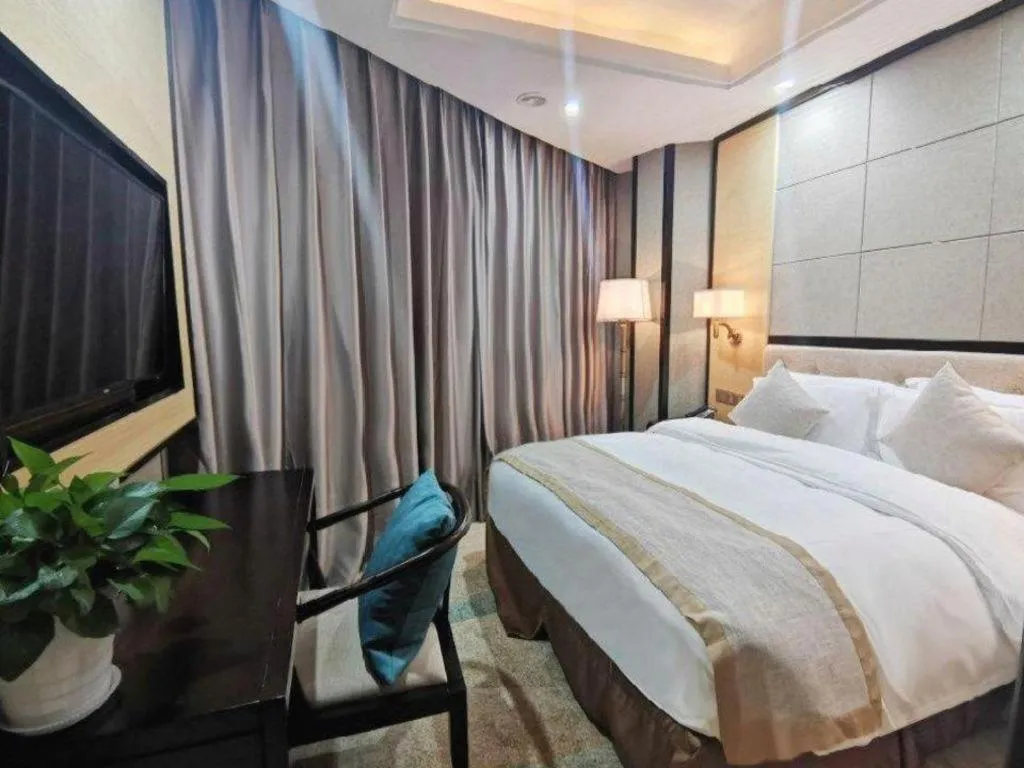 Bed in Hundred Hotel Qingdao