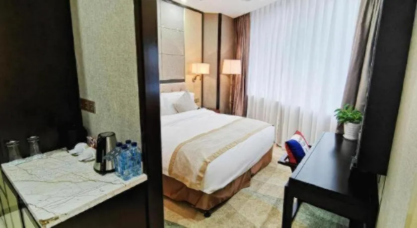 Bed in Hundred Hotel Qingdao