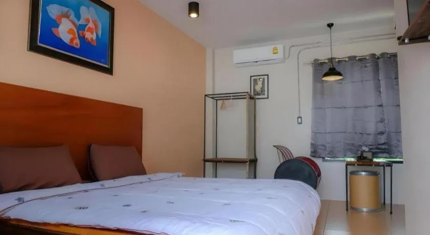 Bed in RiverHills Resort