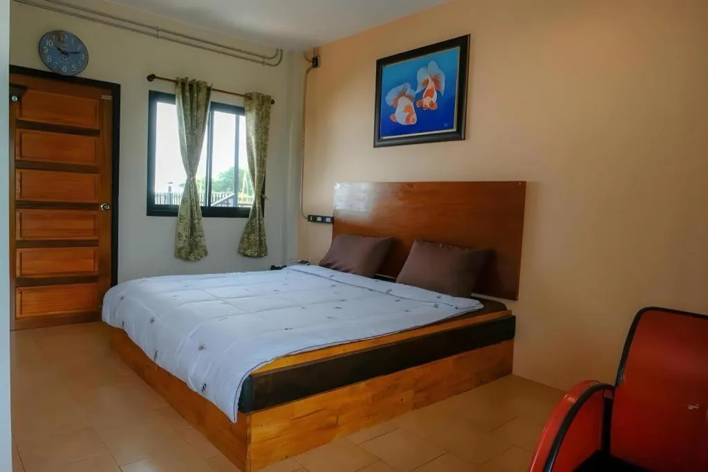 Bed in RiverHills Resort