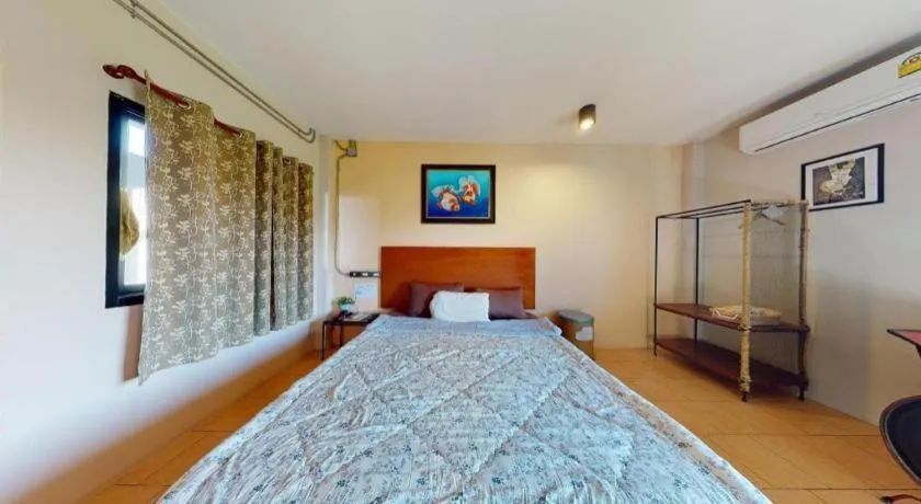 Bed in RiverHills Resort