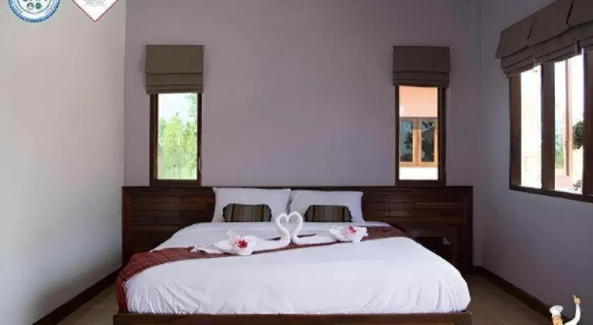 Bed in Baan Home Resort