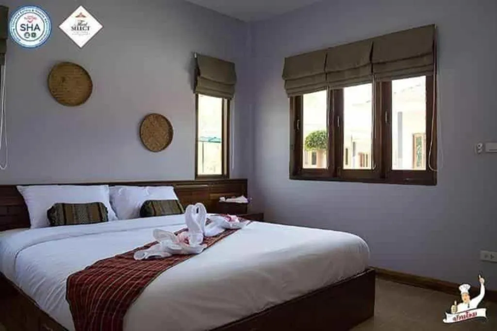 Bed in Baan Home Resort