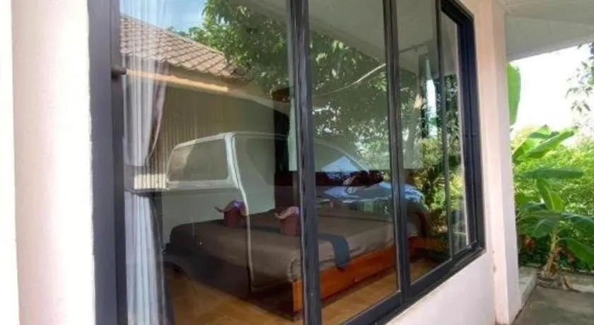 Bed in Baan Home Resort