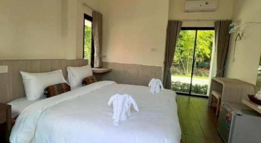 Bed in Baan Home Resort